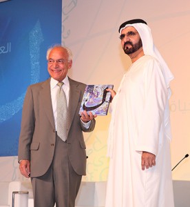 Dr Farouk El-Baz hands the report to Sheikh Mohammad