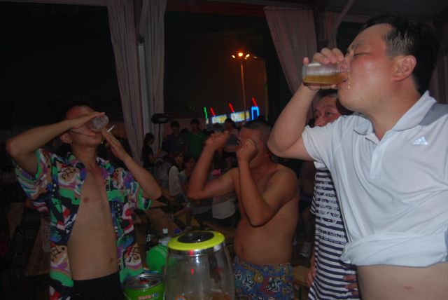 Getting sloppy at the Qingdao Beer Festival.