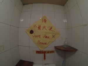 More funny signs in Chinese bathrooms.