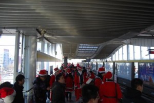 Santa goes green and takes public transport.