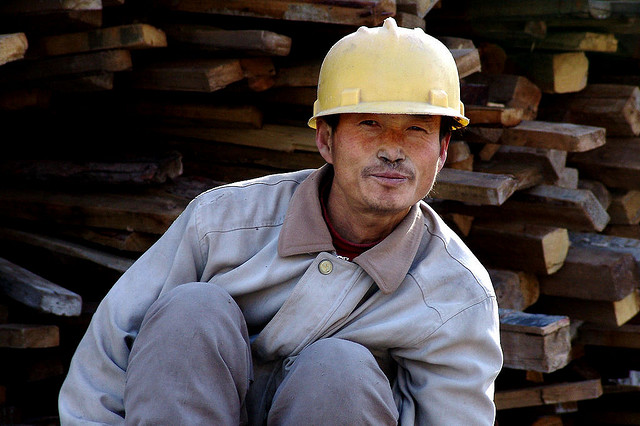 A construction worker in China. Image by Saad Akhtar from www.flickr.com