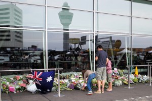 Many flowers, condolences and wishes have been laid down at the Schiphol Airport gate where the MH17 departed.