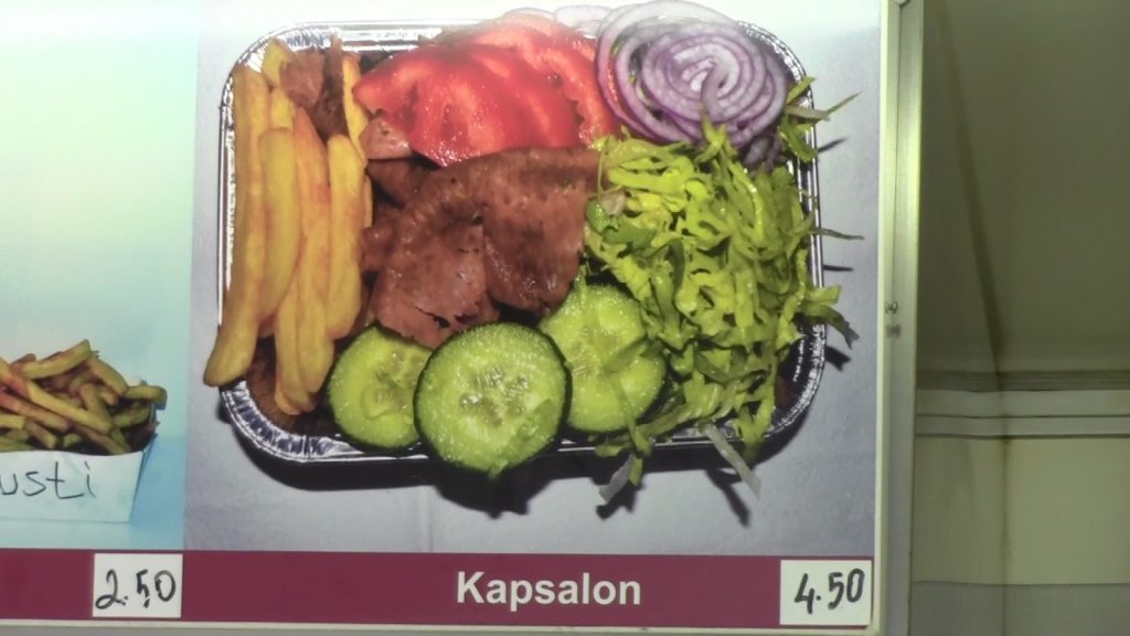 The Kapsalon - rich with shawarma, fries, garlic sauce, cheese, and some salad