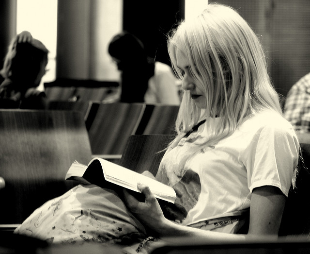 Woman reading a book, a bookworm.