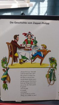 Der Zappel-Phillip. Own photo from the book Der Struwwelpeter by Heinrich Hoffmann.