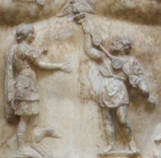 Detail of the Augustus of Prima Porta (Vatican Museums, Rome) showing a Parthian man returning the eagle standards to Augustus after they were lost by Crassus at the Battle of Carrhae in 53 BC. Courtesy of Wikimedia Commons.