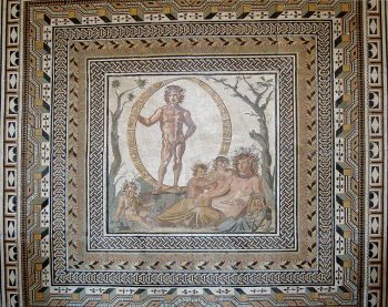 Central part of a great floor mosaic from a Roman villa in Sentinum (today Sassoferrato in Marche), ca. 200–250 CE. Aion, god of eternity, in a celestial sphere decorated with zodiacal signs. Courtesy of Wikimedia Commons.