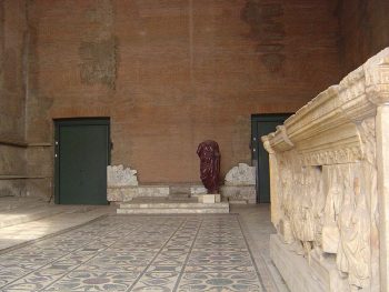 Curia (or Curia Julia), the Restored Senate House of Ancient Rome, in the Roman Forum, Rome, Italy. Courtesy of Wikimedia Commons.