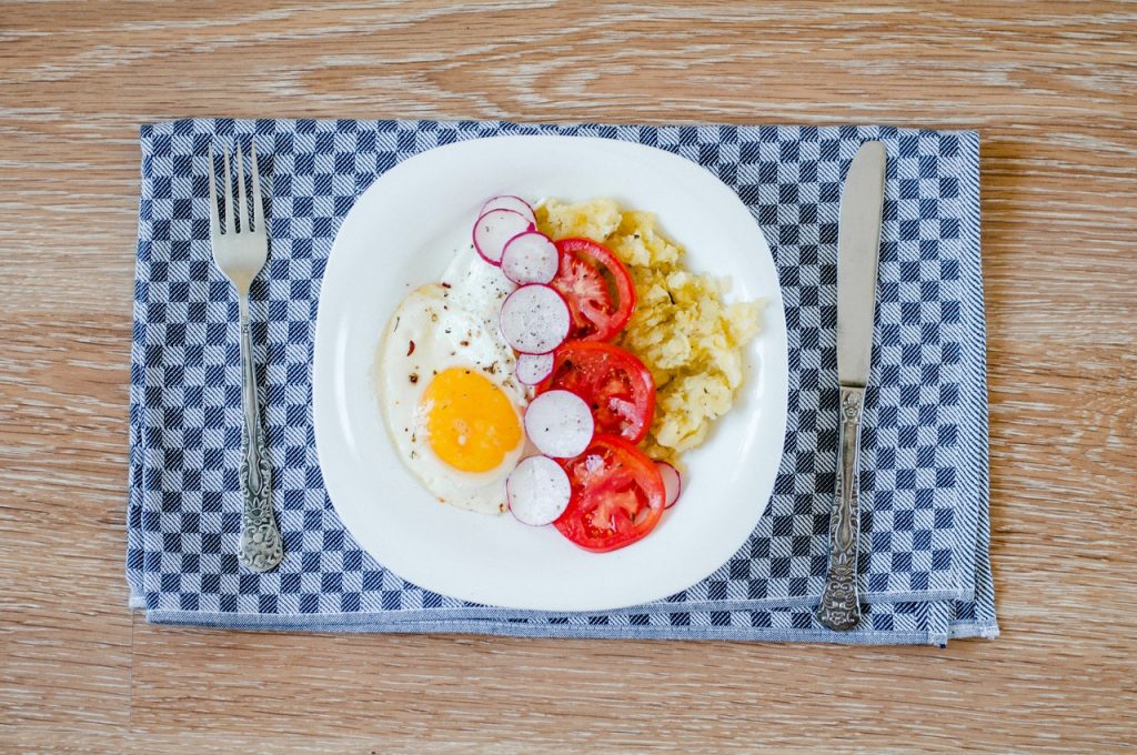 eggs and side dishes on a plate