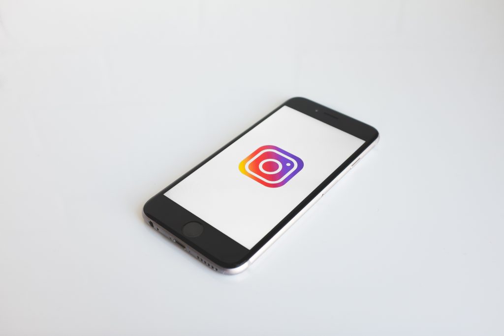 Instagram logo on phone screen