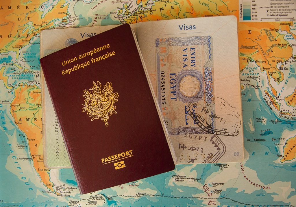 French passport on top of a map