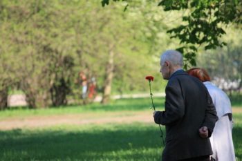 a couple at the cemetery