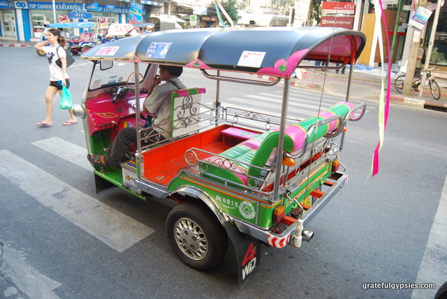 Take a tuk-tuk (รถตุ๊กตุ๊ก), Thailand's most famous mode of transport!